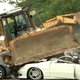 Illustration for article titled Watch In Horror As The Philippines Bulldozes Priceless Sports Cars To Combat Smugglingem/em